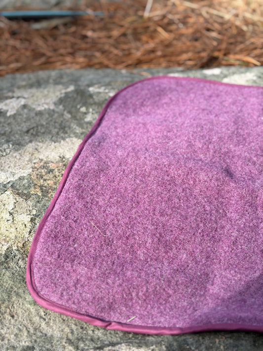 Sitteunderlag i ull